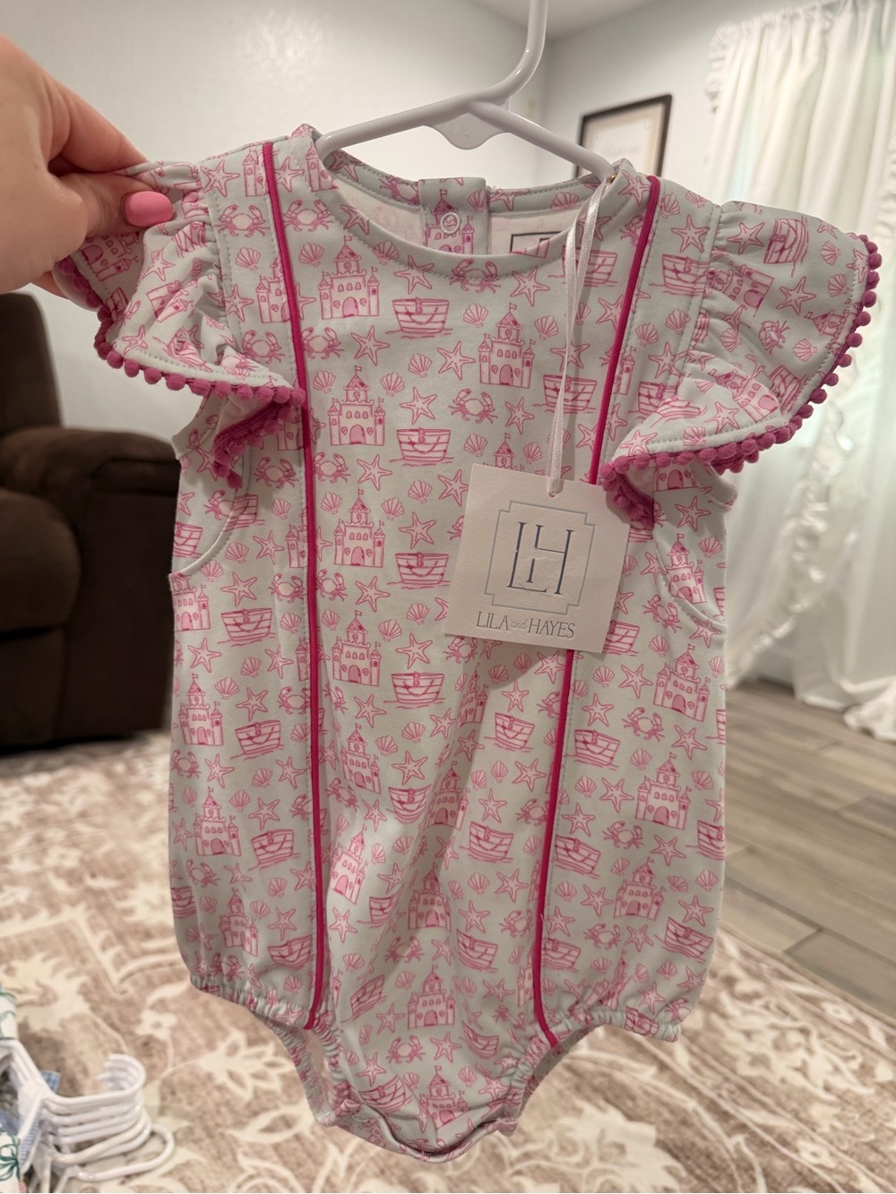 Lila + Hayes Pink Castle Print Ruffle-Sleeve Baby Bodysuit